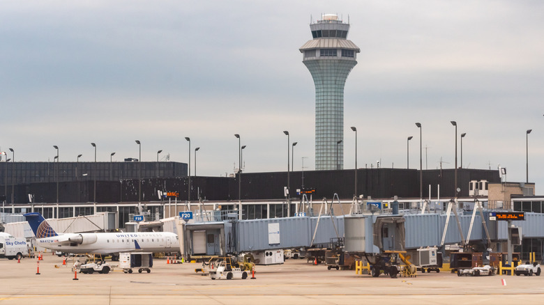 United airlines planes parked at the gate in O'Hare with the ATC in the background