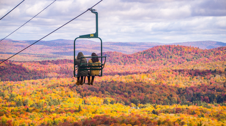 ski lift couple enjoying foliage