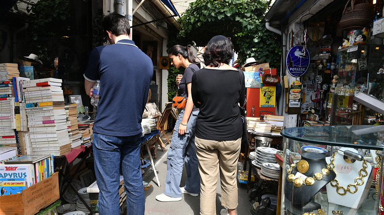 Shoppers browse Marché aux Puces de Saint-Ouen