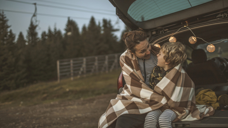 Mom and son in blanket