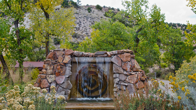 The sandstone fountain at the entrance to Ojo Caliente.