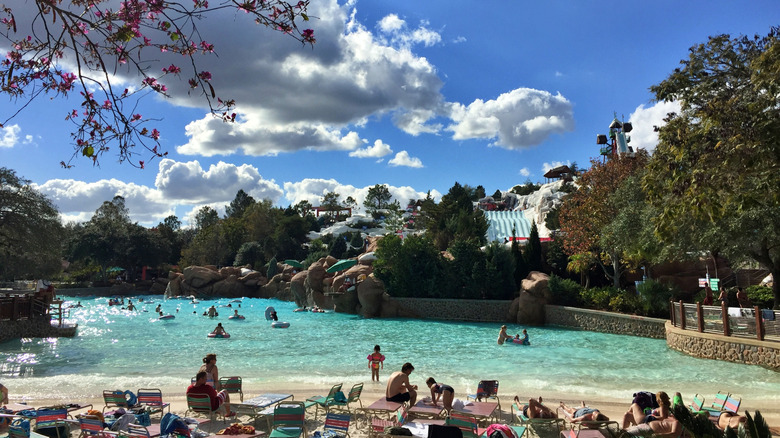 Disney's Blizzard Beach with people in water and lounging on chairs