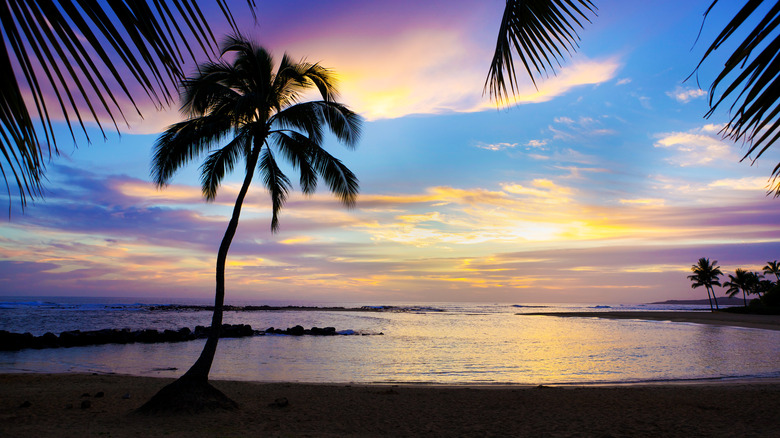sunset over Poipu Beach in Hawaii