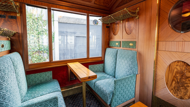 Luxury wood-panelled interior of GoldenPass train