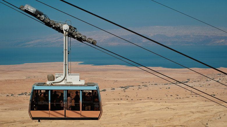 Cable car with tourists 