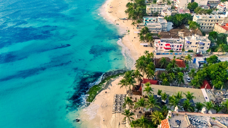 Aerial view of Playa del Carmen, Mexico, with turquoise waters and reefs
