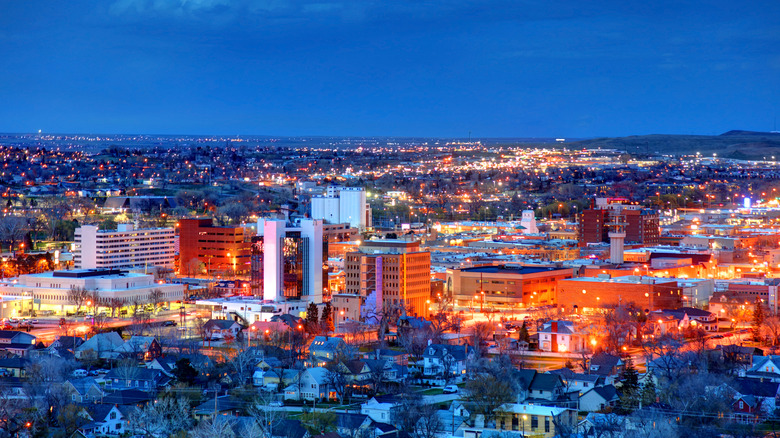 Aerial view of Rapid City in South Dakota lit up at night.