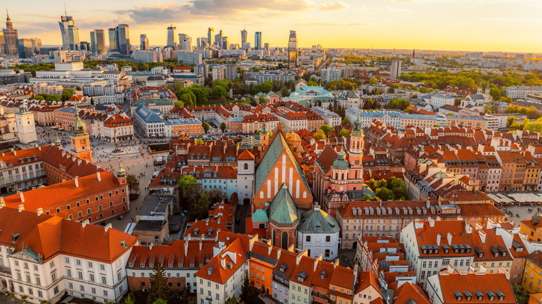 Aerial view of Warsaw's old city center and skyscrapers in the background