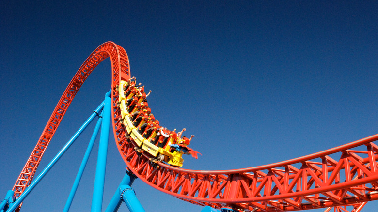 roller coaster against blue sky