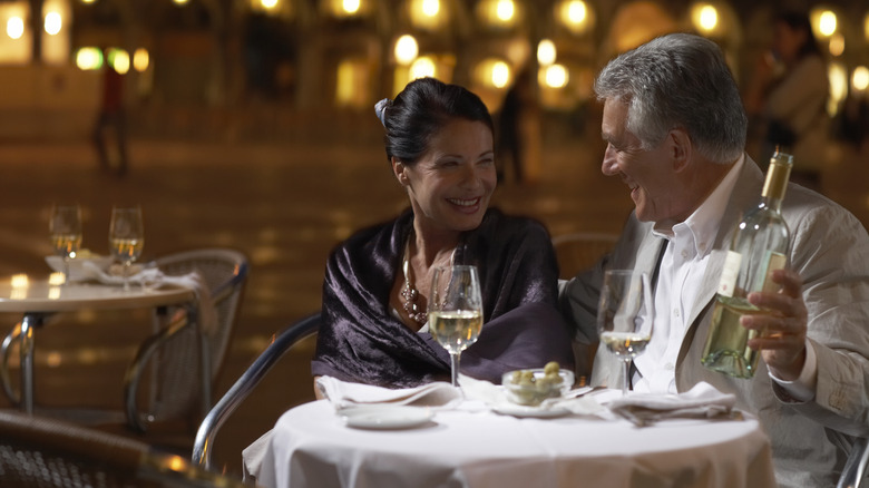 Couple having romantic dinner Italy