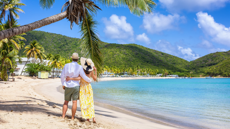 A couple on a Caribbean beach.
