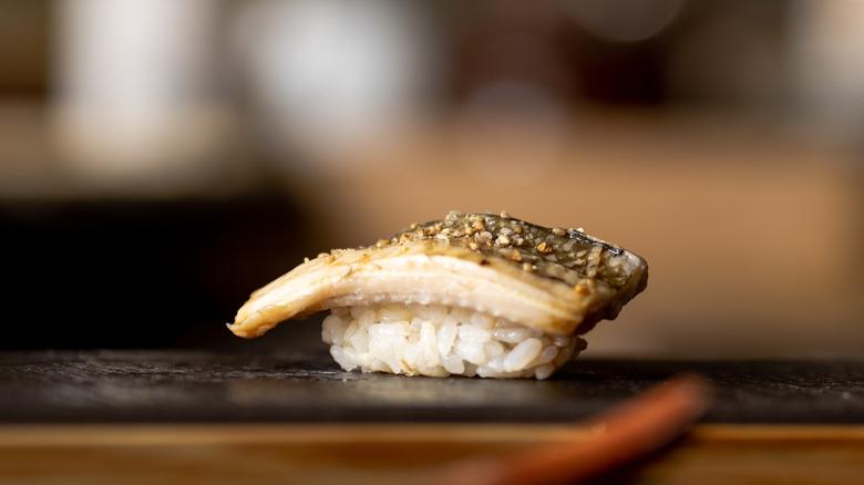 Fish on rice sushi dish