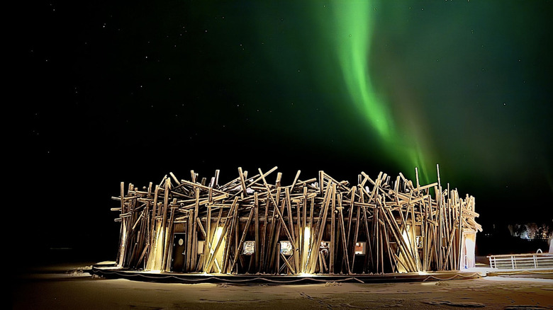 Arctic Bath Sweden sauna and pool under northern lights