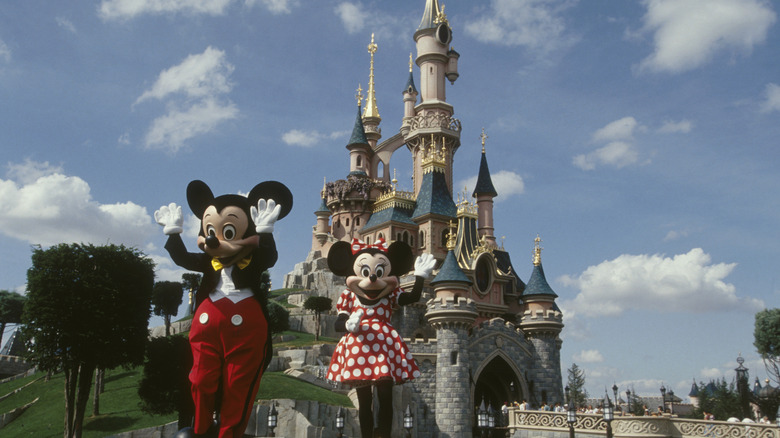 Mickey Minnie frolicking Disneyland Paris castle