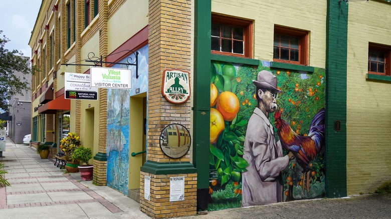 building corner with mural and sidewalks in DeLand Florida