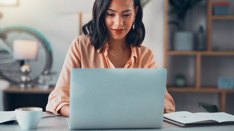 person on computer