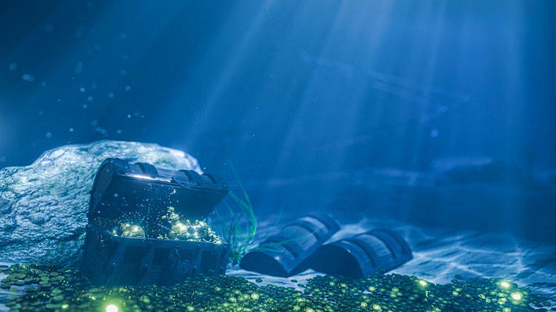 Golden treasure chest hidden beneath the sea filled with precious coins