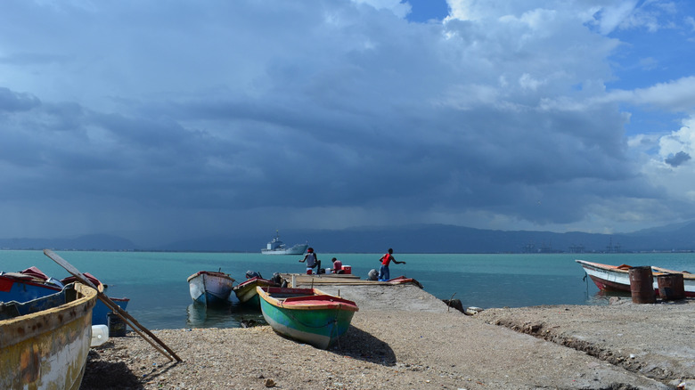 Small boats hauled up the coast in Port Royal Kingston Jamaica