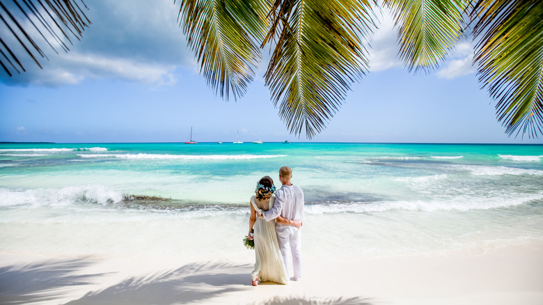 Newlyweds at a beautiful beach