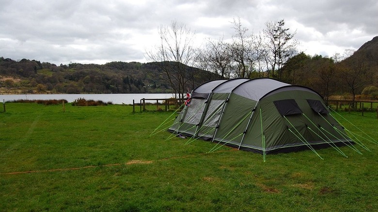 tent in large green field at Llyn Gwynant, Wales