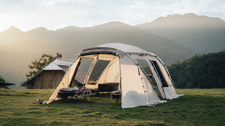 big tent set up on a hill