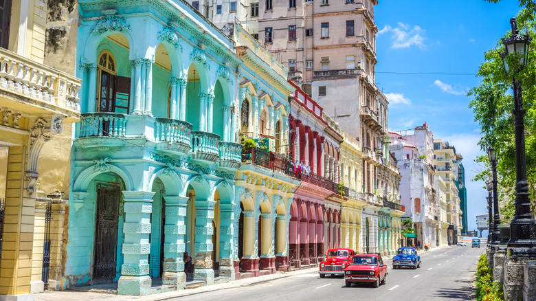 Colorful buildings and cars in Havana, Cuba.