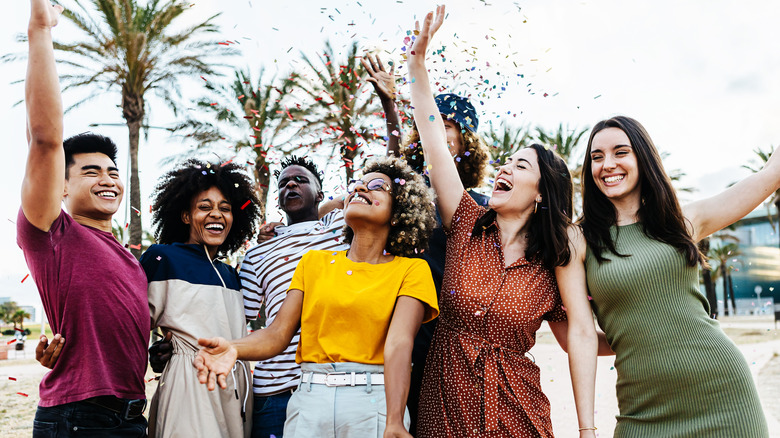 group of people smiling partying