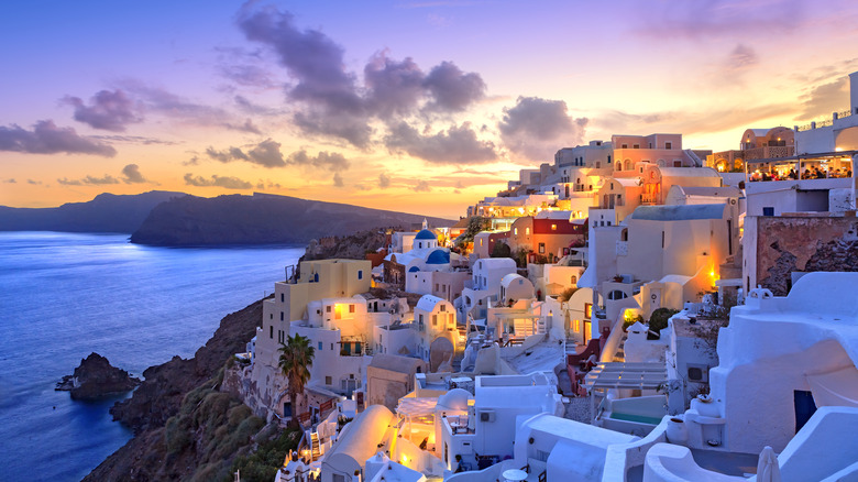sunset over whitewashed island village