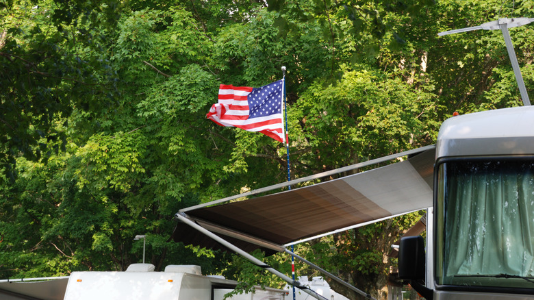American flag waving from RV roof
