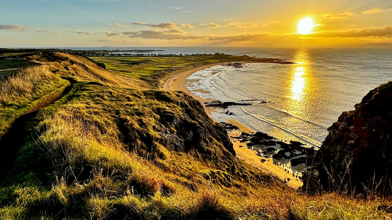 Sunrise on the Fife Coastal Path from Kincraig Point, overlooking West Bay and Elie and Earlsferry, Fife.