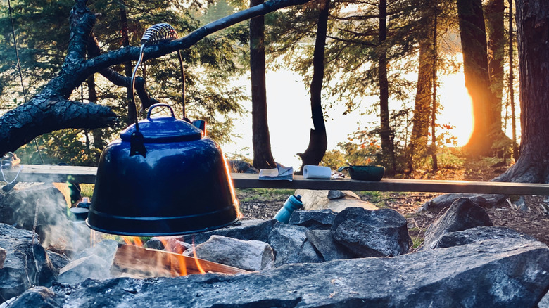 Kettle over campfire