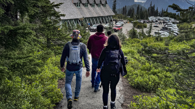 Guests walking around Paradise Inn at Mount Rainier National Park