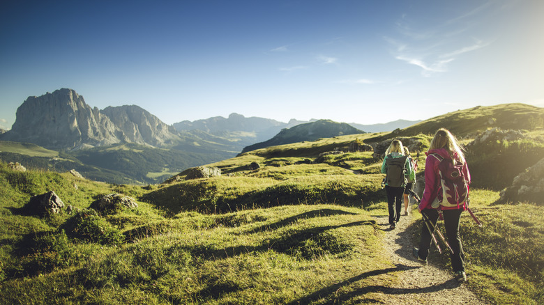 three women on hiking trail