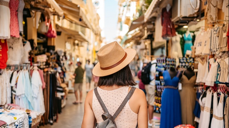 girl shopping for souvenirs