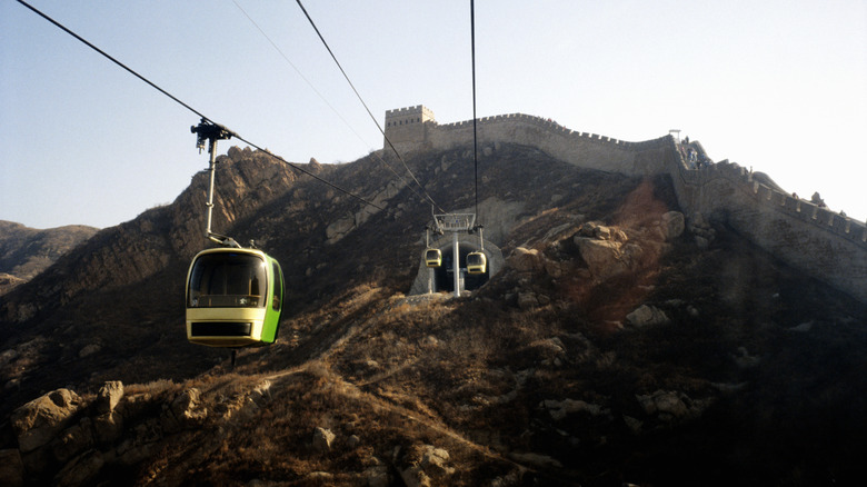 Cable cars passing through the Great Wall of China