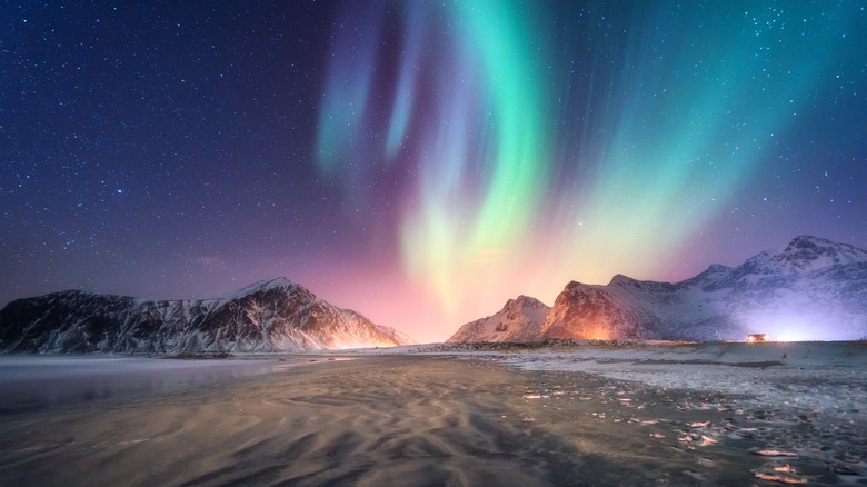 Northern Lights and snowy mountains