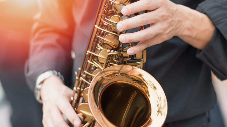 A musician playing saxophone