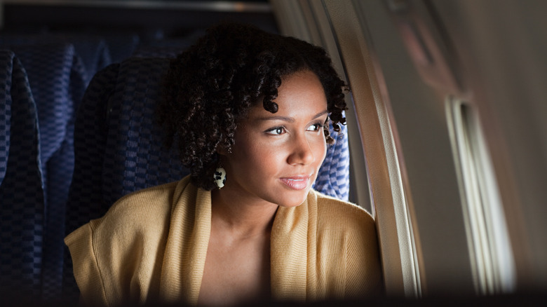 Woman on a plane