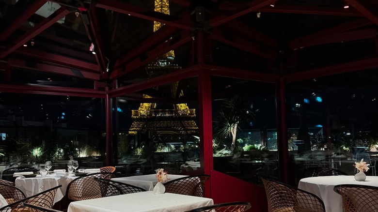 View of Eiffel Tower at night from Les Ombres
