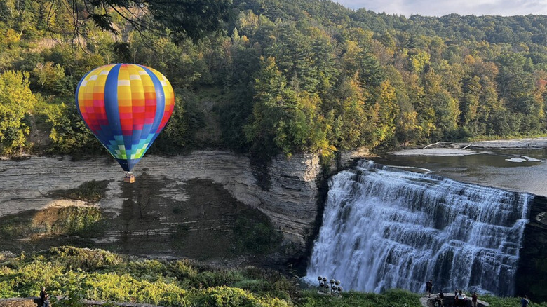 hot air balloon floats over Letchworth State Park in upstate New York