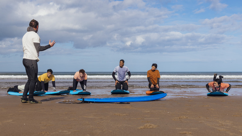 People learning how to surf