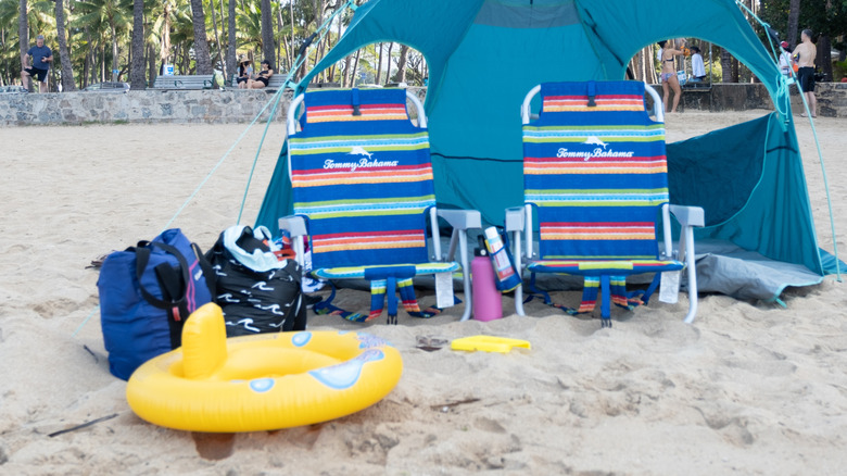blue shade tent on beach