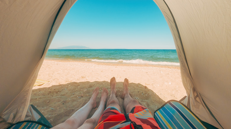 relaxing in beach tent
