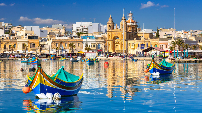 Malta skyline and fishing boats