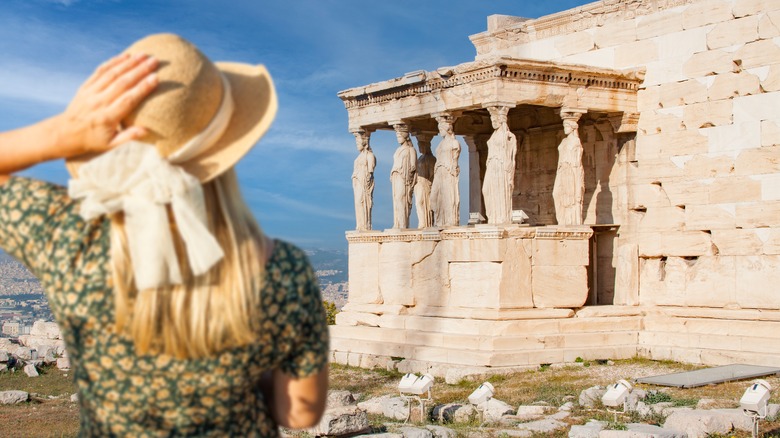 Woman visiting Erechtheion, Greece