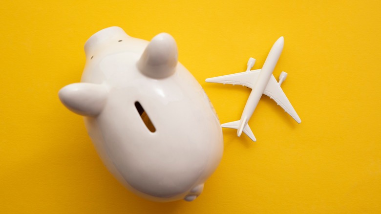 White piggy bank and airplane