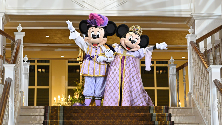 Mickey and Minnie in royal robes at Disneyland Paris.