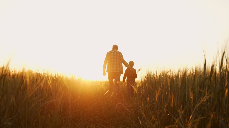 Father and son at sunset