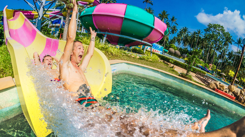 people going down water slide