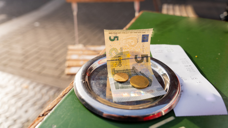 5 Euros on a table at a pub in Ireland